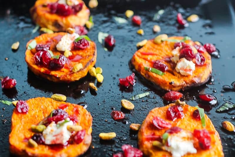 roasted sweet potato salad rounds topped with goat cheese,pistachios, and wine soaked cranberries