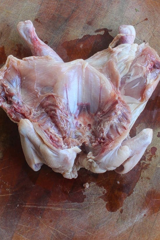 butterflied cut raw chicken