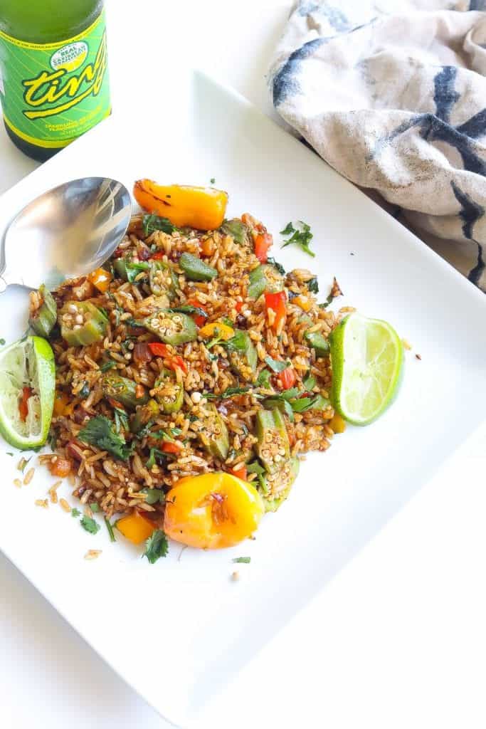 vegetable fried rice with okra on a white plate