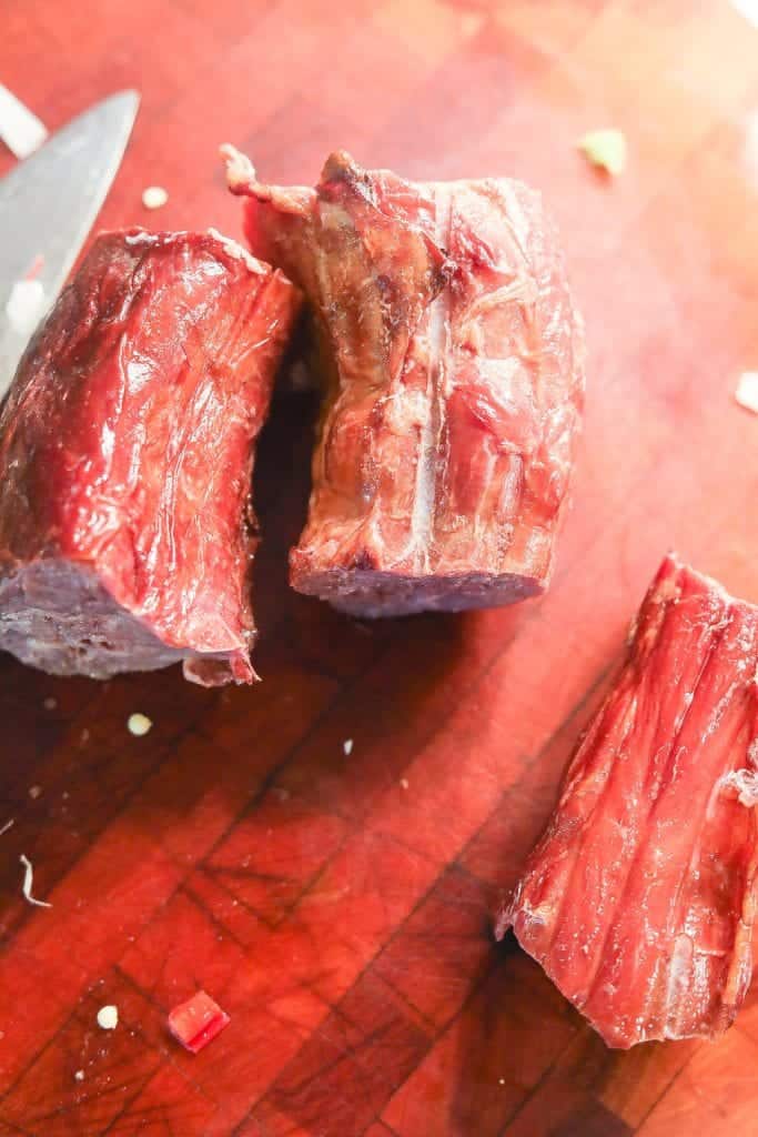 smoked turkey necks on cutting board