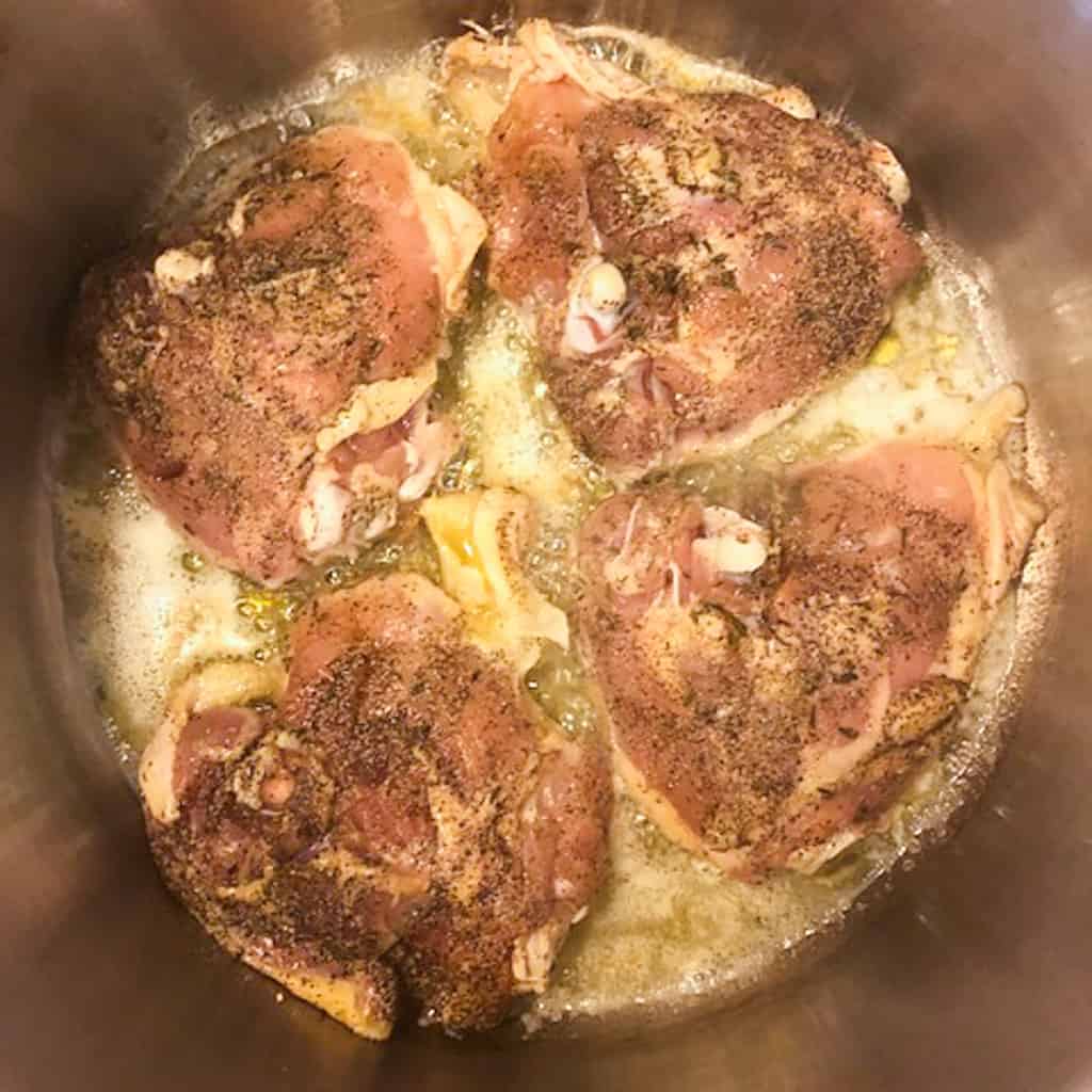 chicken browning in pan