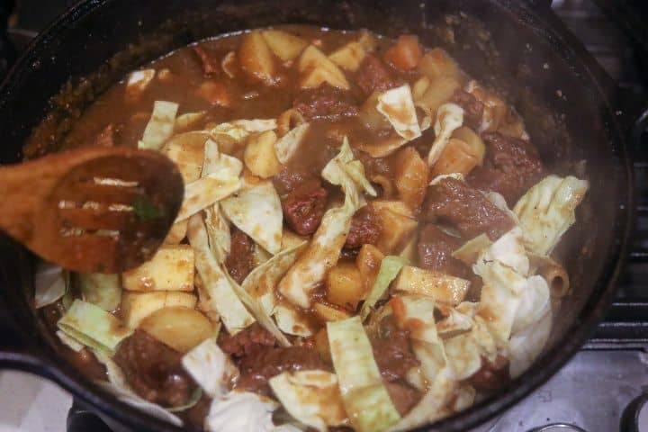 haitian soup stewing in pot