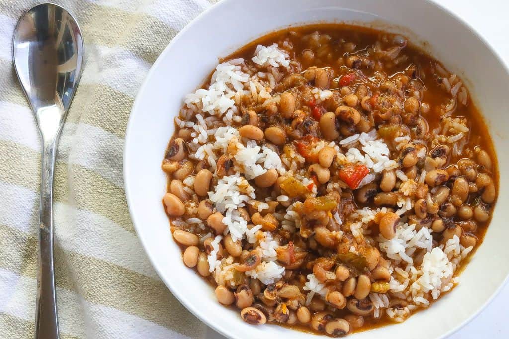 white bowl of black eyed peas and rice