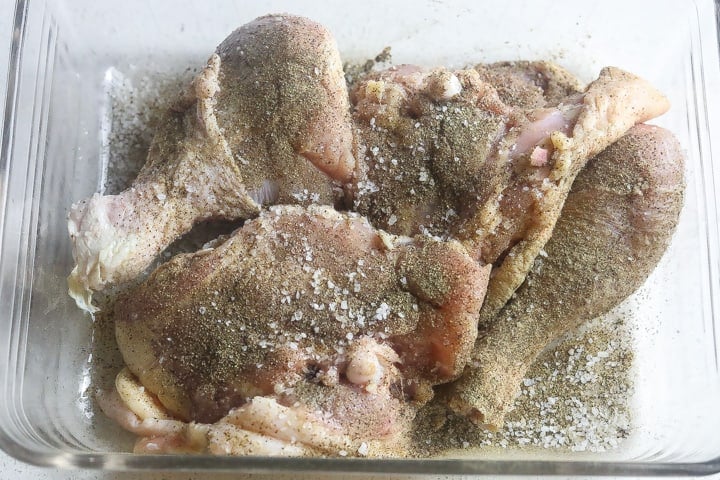 raw chicken seasoned in a bowl