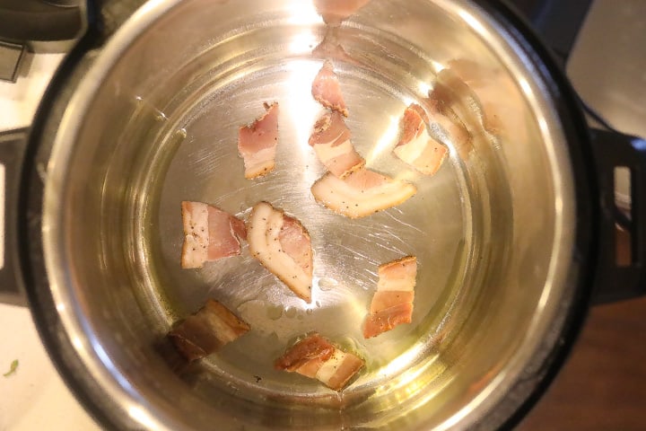 bacon frying in pan