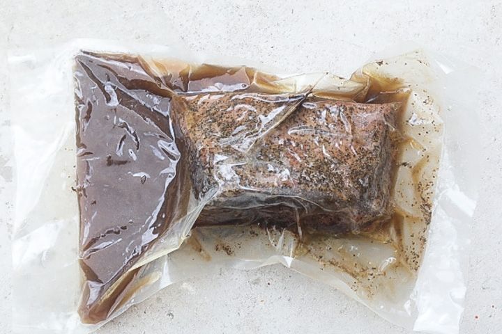cooked brisket in vacuum seal bag