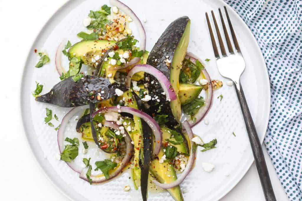 avocado salad on white plate