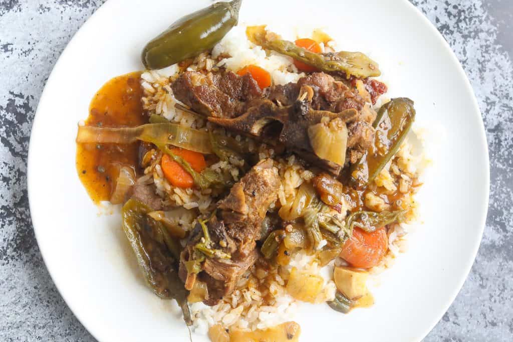 braised neck bones on a white plate