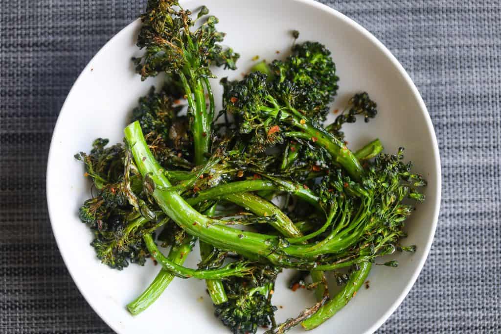 broccolini in a white bowl