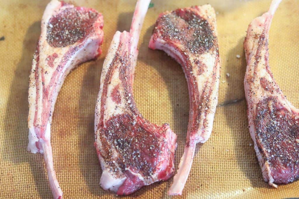 raw lamb seasoned