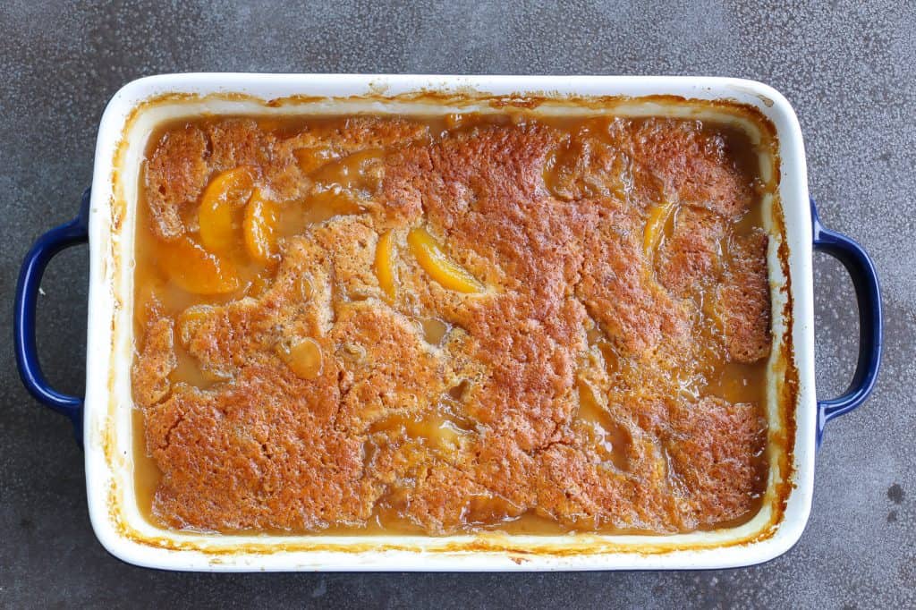 peach cobbler in large pan