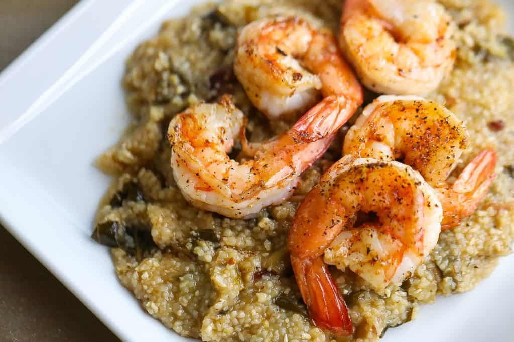 shrimp and grits on a white plate