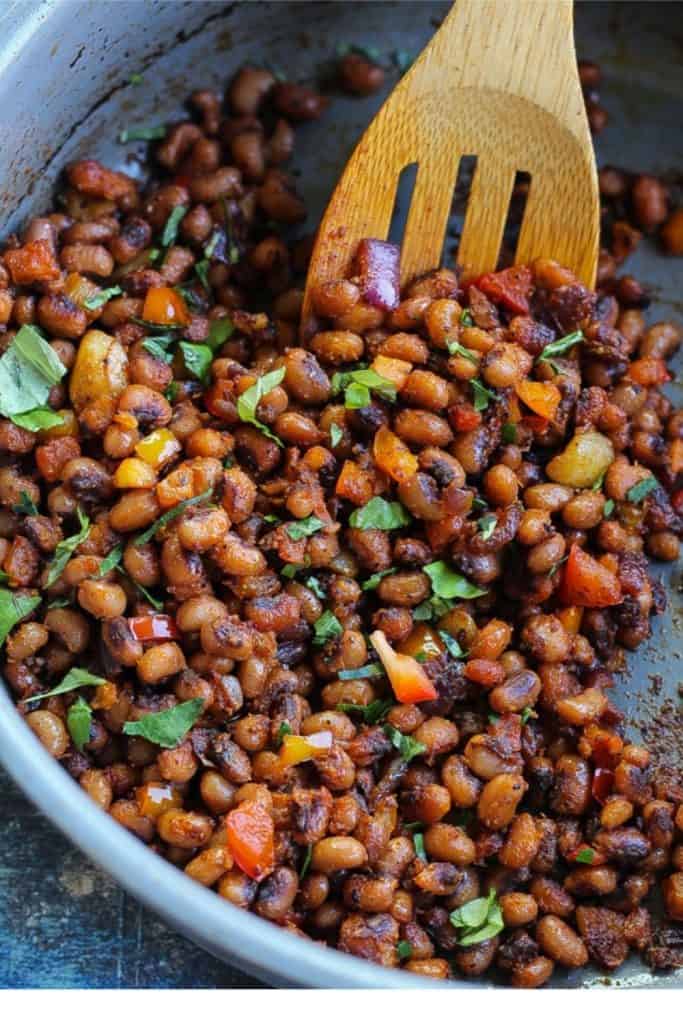 blackeyed peas frying in a pan