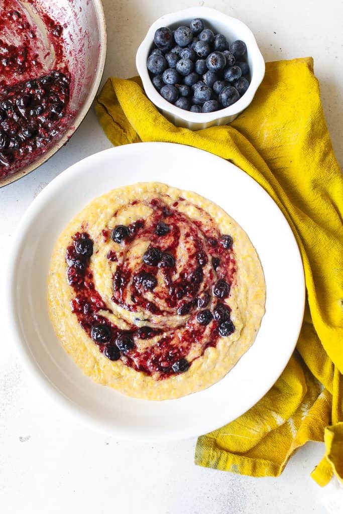 yellow grits topped with berry compote