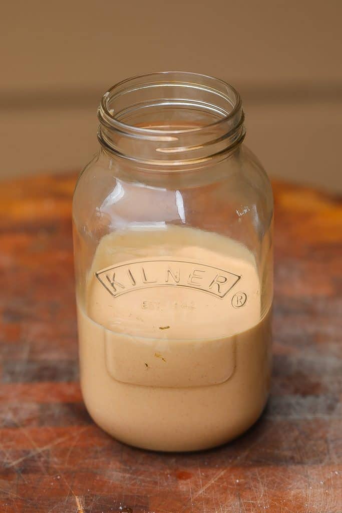 alabama white sauce in a glass bottle