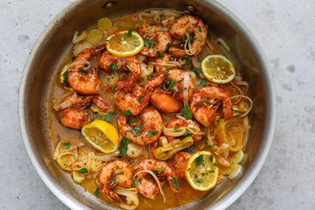 beer steamed shrimp in a pan