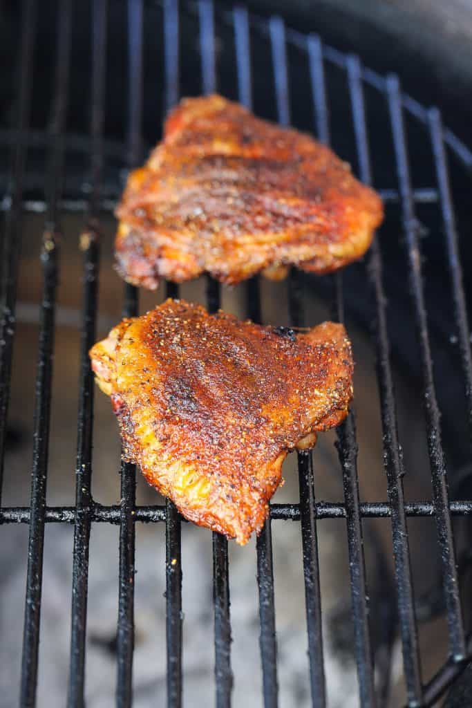 smoked chicken thighs on a grill