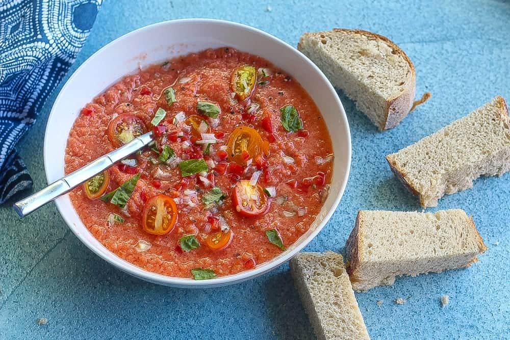 easy gazpacho recipe with heirloom tomatoes, basil and red onions