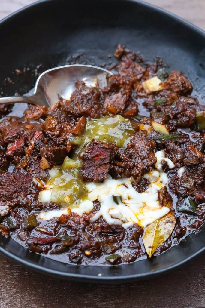 brisket chili in black bowl