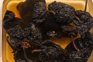 dried chilis in water