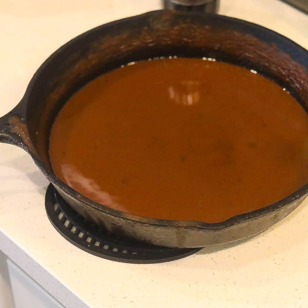 dark brown roux in a skillet