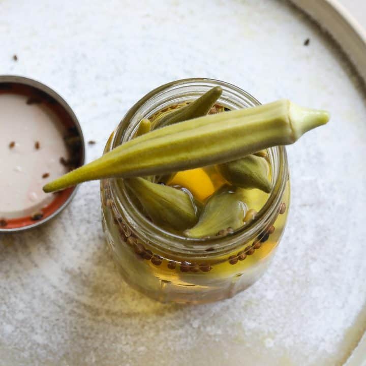 pickled okra in a glass jar