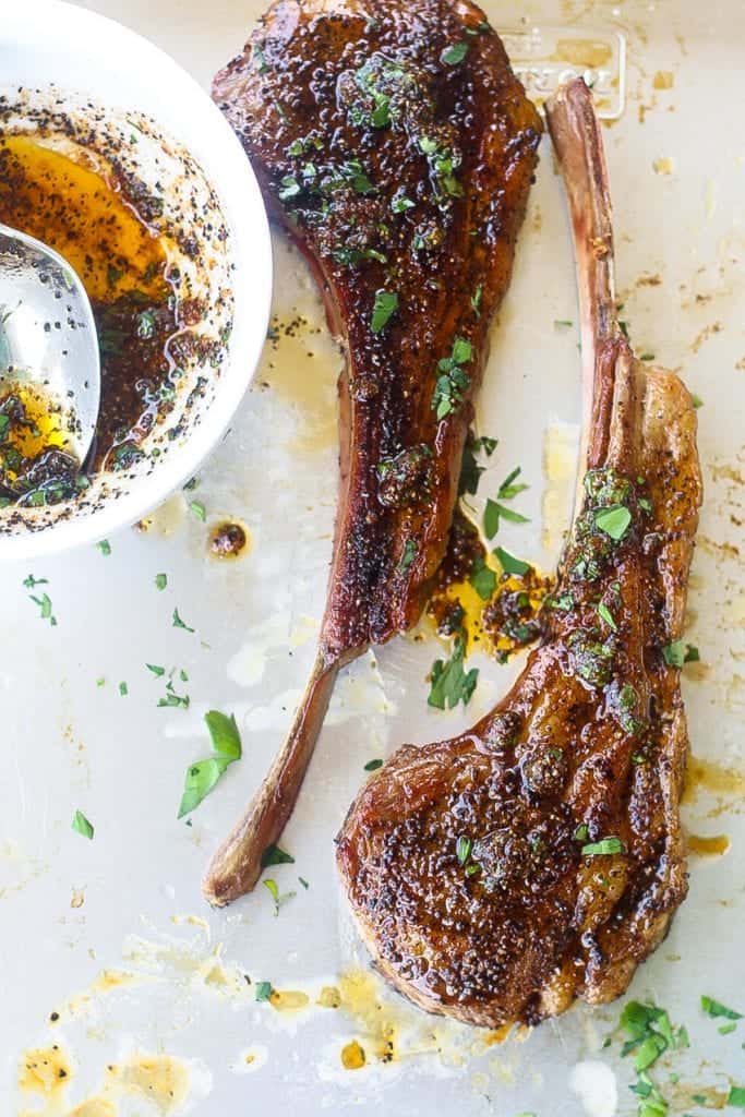 coffee rubbed broiled lamb chops on a tray