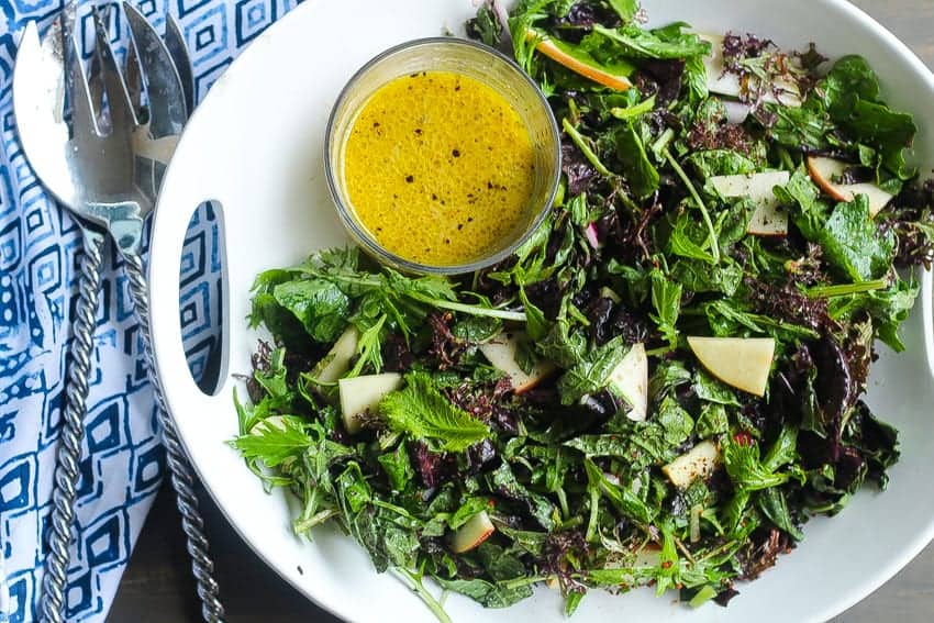 Mixed green salad with mustard dressing