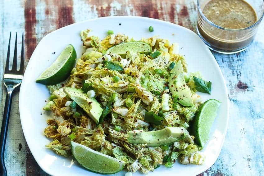 napa cabbage salad on a plate with peanut sauce on the side #salad www.foodfidelity.com