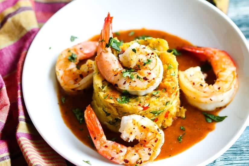 mofongo relleno topped with shrimp and red pepper sauce #shrimp #mofongo www.foodfidelity.com