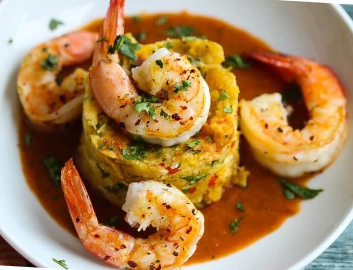 mofongo relleno topped with shrimp and red pepper sauce #shrimp #mofongo www.foodfidelity.com