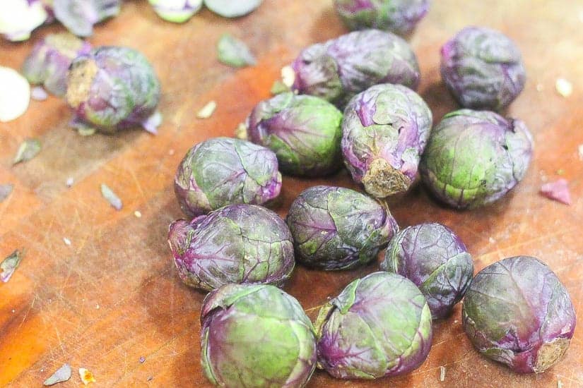 purple brussel sprouts on a cutting board #brusselsprouts www.foodfidelity.com