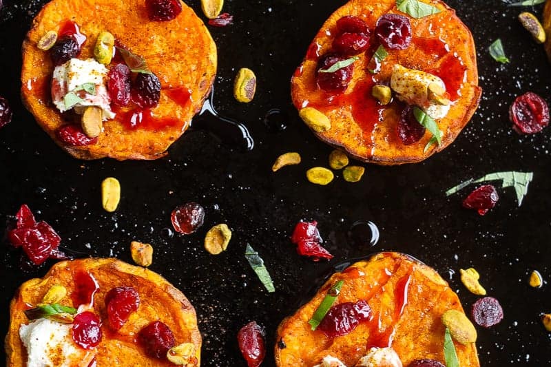 roasted sweet potato salad rounds topped with goat cheese,pistachios, and wine soaked cranberries