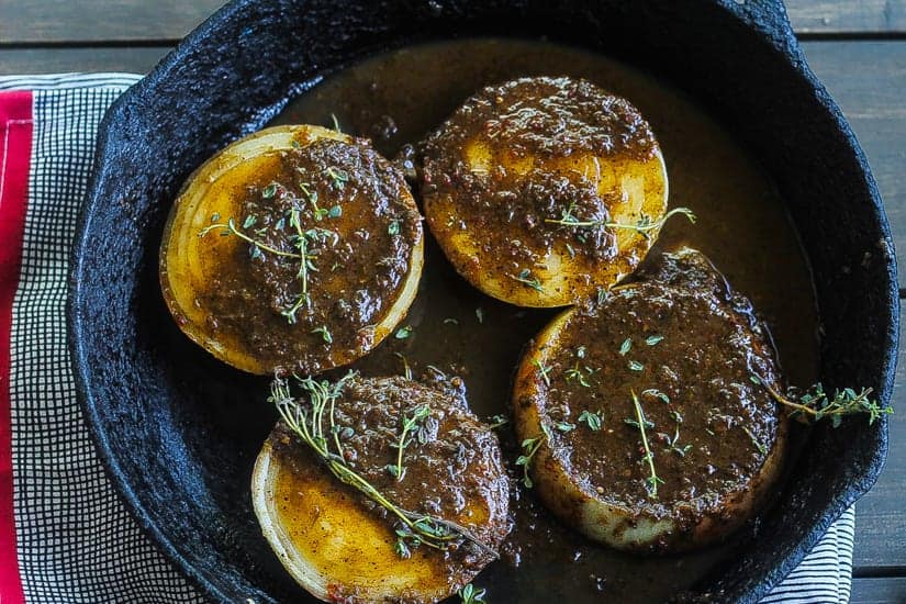 jerk marinated roasted onions topped with fresh thyme