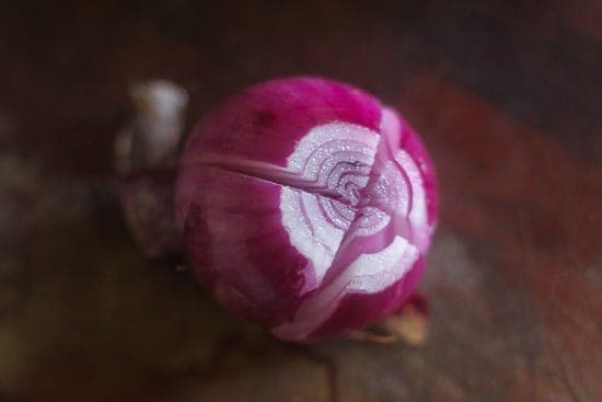 rmini red onion with crisscrossed cuts
