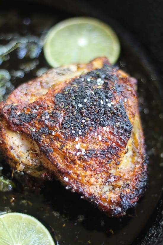 Pan Roasted Jerk Chicken Thighs in a pan
