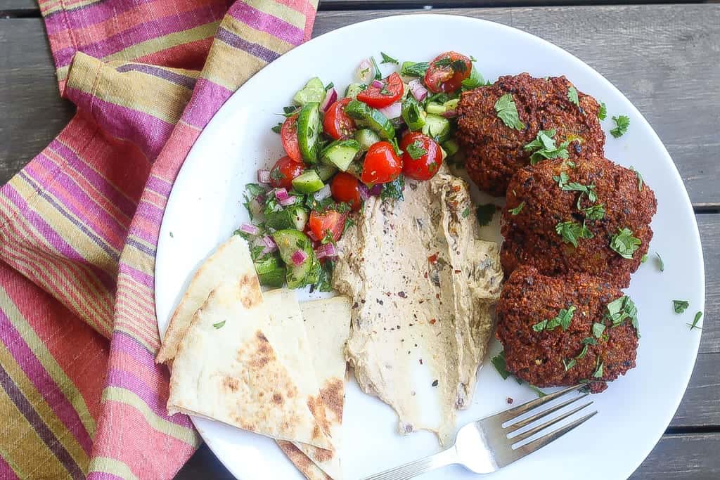 blackeyed pea falafel with hummus and persian cucumber salad