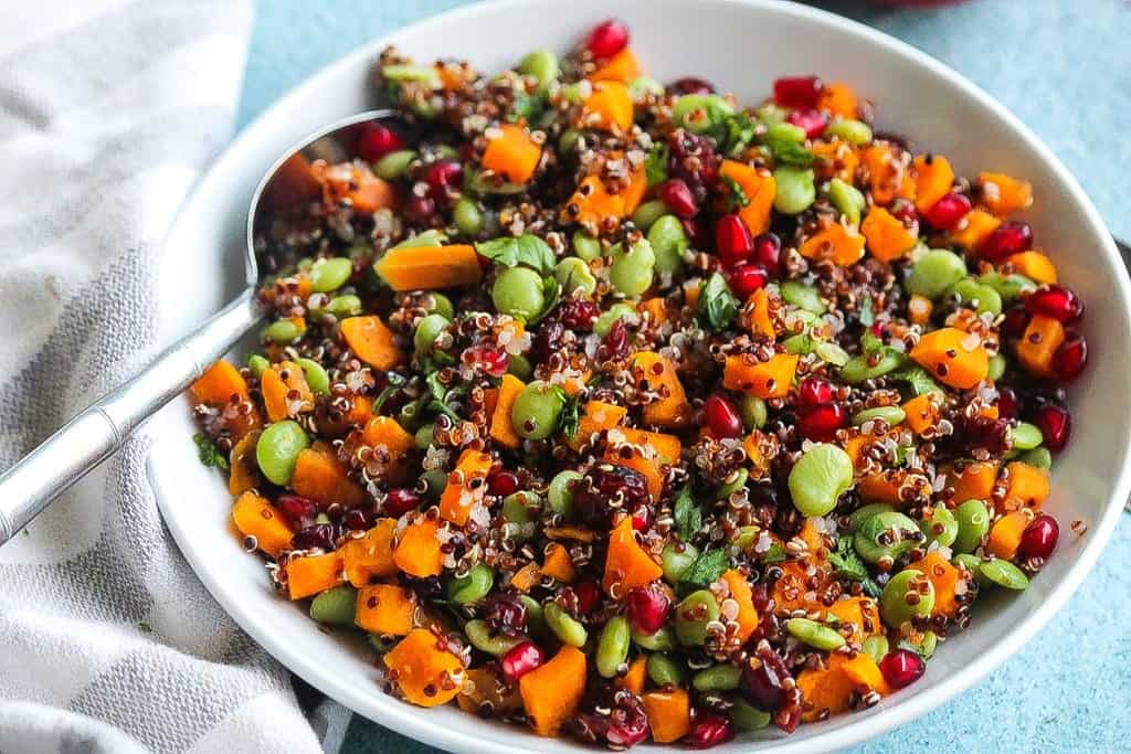 easy vegan quinoa salad with pomegranate and vegetables