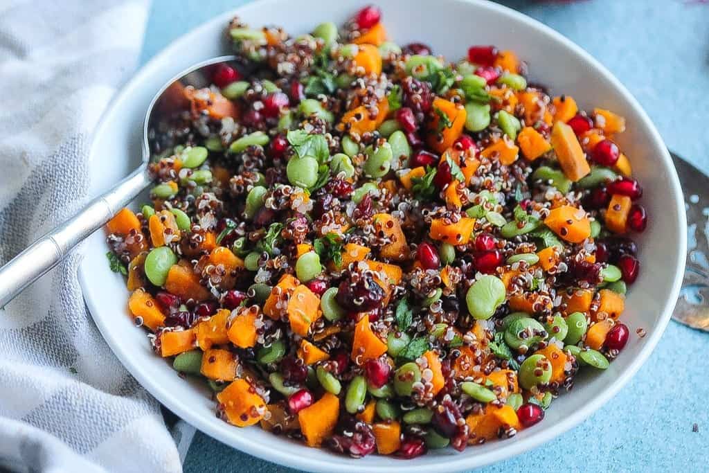 easy vegan quinoa salad with pomegranate and vegetables