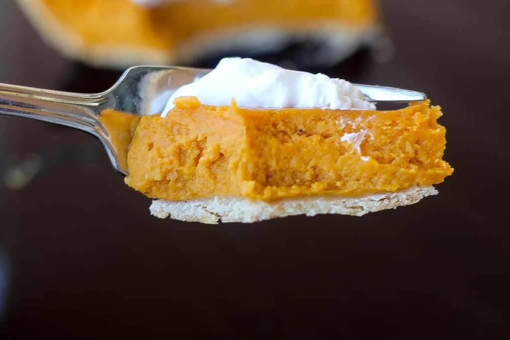 Southern sweet potato pie with cream on a plate