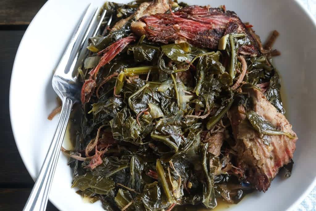 collard greens with brisket in bowl