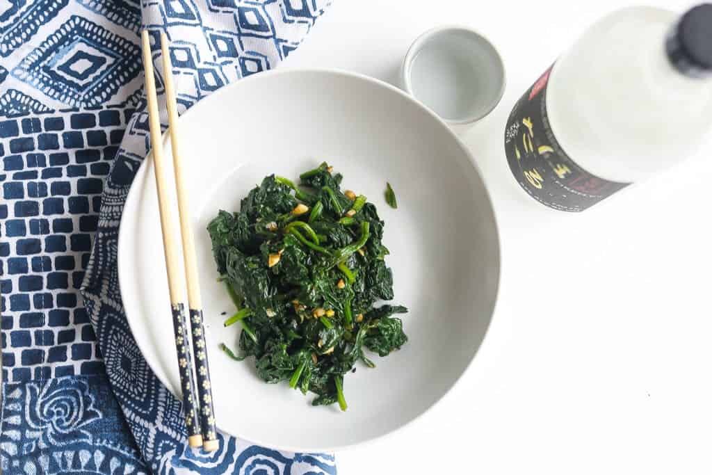 blanched spinach side dish in a bowl