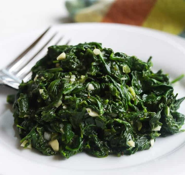 blanched spinach side dish in a bowl