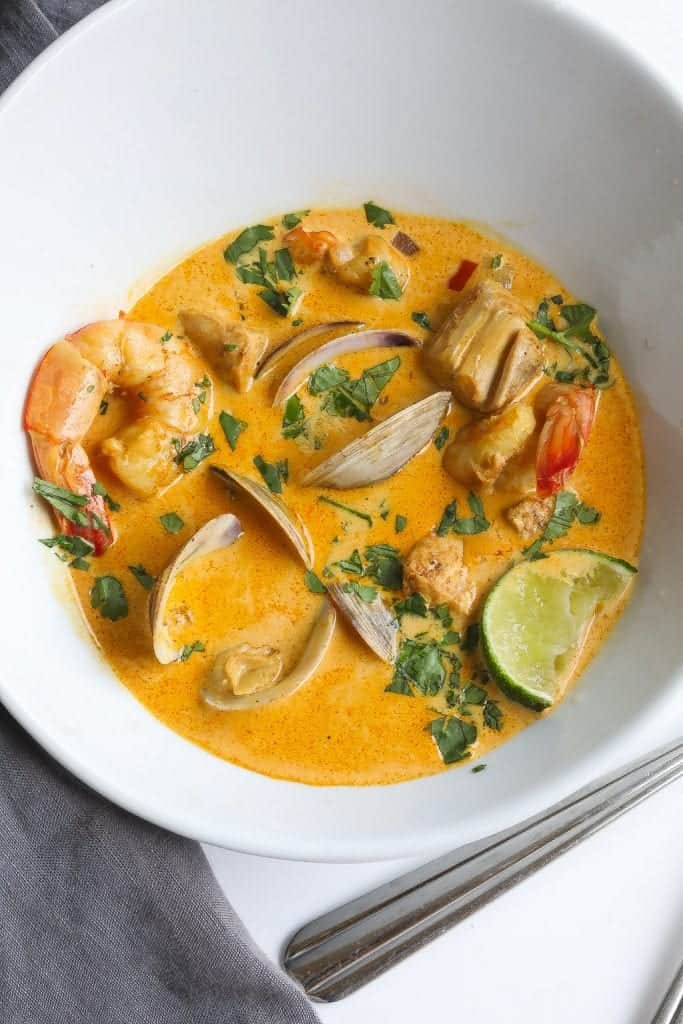 cazuela de mariscos (colombian seafood stew) in a white bowl