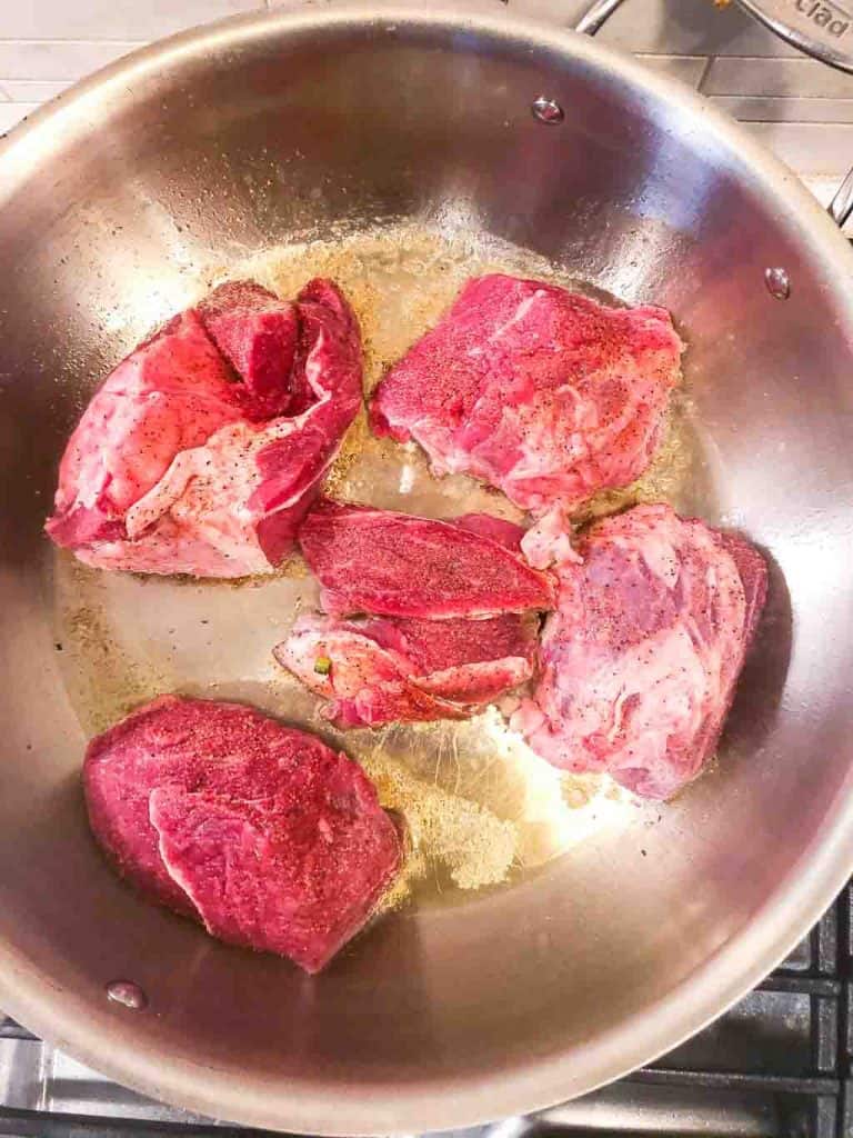beef browning in pan
