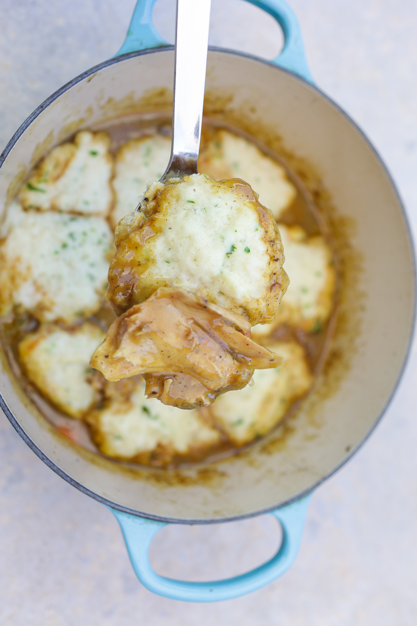 Southern chicken and dumplings in a blue pot