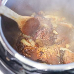 brisket and onions cooking in instant pot