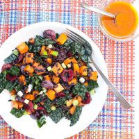 black rice salad with sweet potatoes and cherries in a bowl