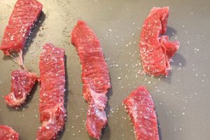sa;ted pieces of beef