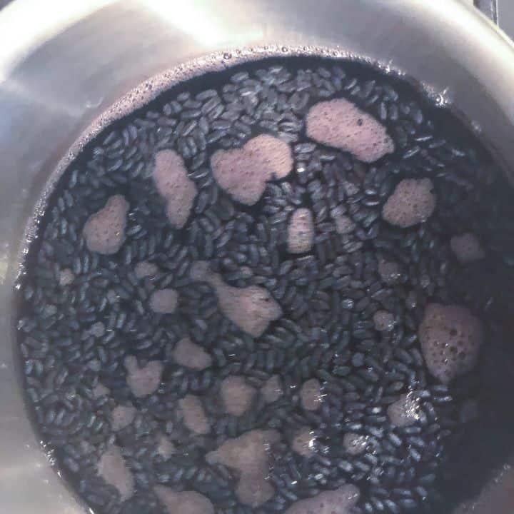 black rice boiling